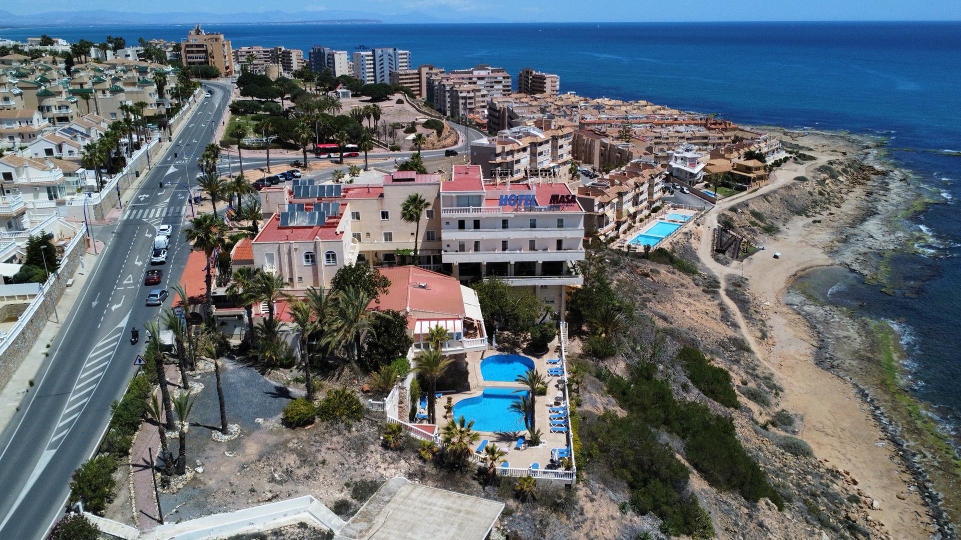 Orihuela Costa — Costa Blanca South's premium coastal strip — Playa Flamenca, La Zenia, Cabo Roig, Villamartin golf, and Campoamor.