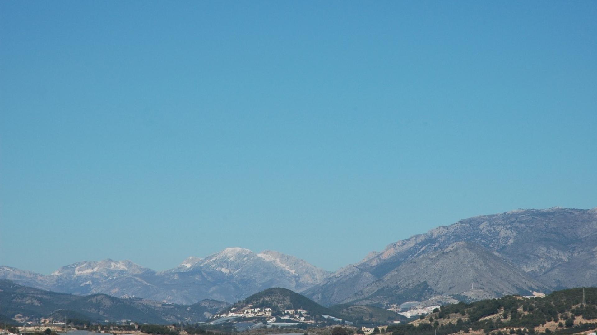 Polop de la Marina — A picturesque inland village above Benidorm with a medieval castle, famous mountain spring, panoramic bay views, and excellent-value villa plots.
