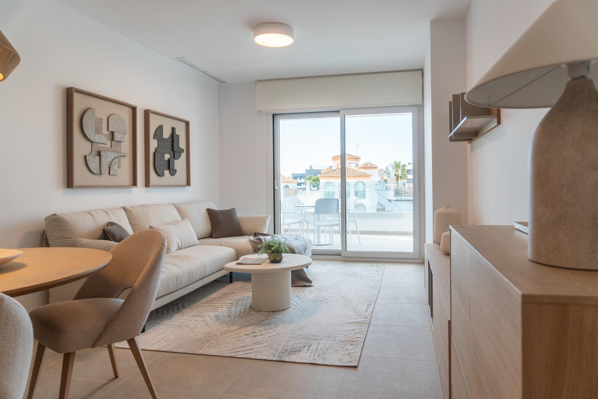Playa Flamenca — Family-friendly Orihuela Costa beach zone with a wide sandy beach, lively promenade, and excellent value for apartment buyers.