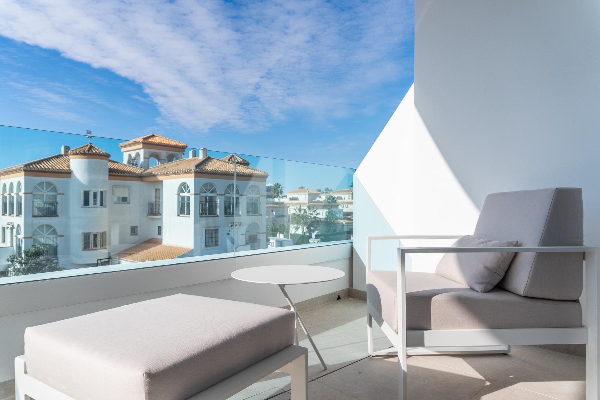 Punta Prima — Northernmost tip of Orihuela Costa — a sandy beach, seafront apartments, and direct walking access to Torrevieja's facilities.